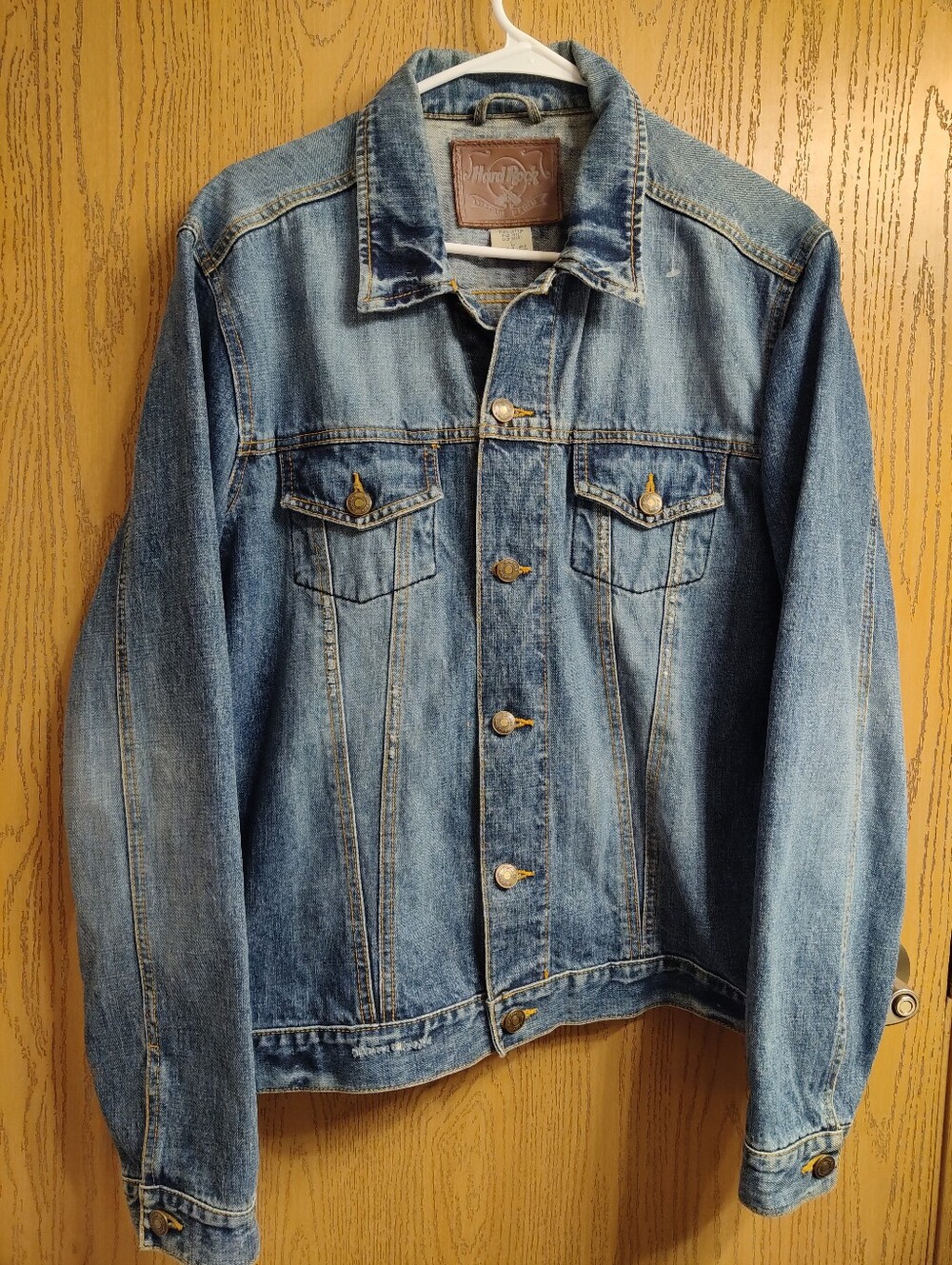 Hard Rock Cafe Brown Leather Patch on Blue Denim